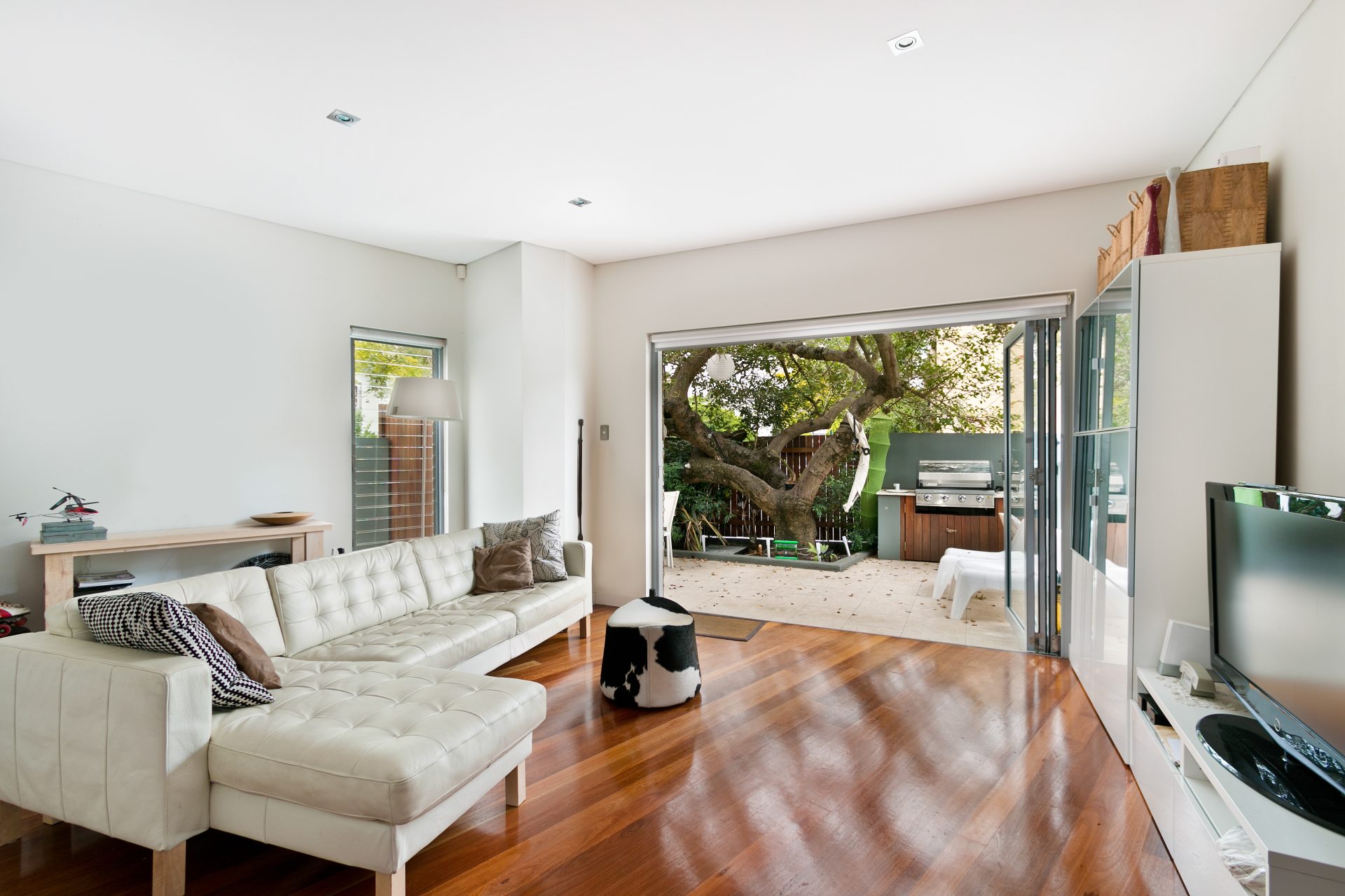 living room with folded doors